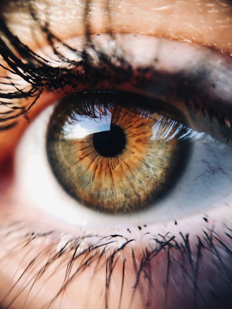 Close-up of eyes enhanced by limbal ring lenses for looksmaxxing